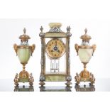 EARLY 20TH CENTURY FRENCH ALABASTER AND ENAMEL CLOCK GARNITURE
with brass dial with Arabic numerals,