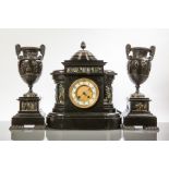 VICTORIAN ARCHITECTURAL BLACK SLATE AND PATINATED METAL CLOCK GARNITURE
the clock with Arabic