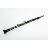 ENGLISH EBONY CLARINET
stamped 'Made in London', with its mouthpiece and case,