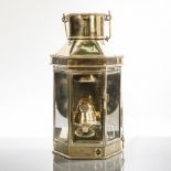 BULPITT BRASS SHIP'S BULK HEAD OIL LAMP 
with three glass panels and a wooden mounted swing handle,