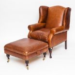 TAN LEATHER WINGBACK ARMCHAIR
on cabriole legs, with matching square footstool,