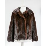 LADY'S DARK CHOCOLATE MINK JACKET
with scalloped shelves and hem,