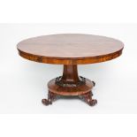 WILLIAM IV ROSEWOOD CIRCULAR DINING TABLE 
on quadripartite base with scroll feet, on castors,