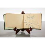 AUTOGRAPH BOOK SIGNED BY THE BEATLES
signed by the four members of The Beatles in blue ink,