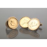 PAIR OF NINE CARAT GOLD CUFF LINKS SET WITH TWO RAND FINE GOLD COINS
together with a nine carat