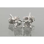 PAIR OF DIAMOND STUD EARRINGS 
each set with a brilliant cut diamond of approximately 0.