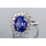 OUTSTANDING TANZANITE AND DIAMOND CLUSTER RING
the central cushion cut tanzanite 5.