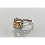 CERTIFICATED FANCY VIVID YELLOW DIAMOND RING
the central square yellow diamond of 2.