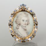 ORNATE EARLY NINETEENTH CENTURY PORTRAIT MINIATURE BROOCH
of oval form,