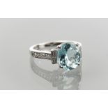 FINE AQUAMARINE AND DIAMOND RING 
set with a single oval aquamarine of approximately 2.