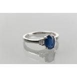 ART DECO STYLE SAPPHIRE AND DIAMOND RING 
with central oval sapphire of 1.