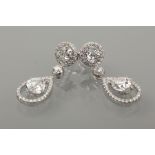 IMPRESSIVE PAIR OF DIAMOND DROP EARRINGS
each set with a pear shaped diamond of approximately 1.