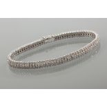 THREE ROW DIAMOND BRACELET
the brilliant cut diamonds totalling approximately 7.