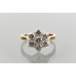 DIAMOND CLUSTER RING
the brilliant cut diamonds totalling approximately 1.