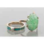 EARLY TWENTIETH CENTURY CARVED JADE RING
carved in a floral design, in nine carat gold,