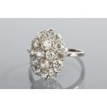 IMPRESSIVE EDWARDIAN PLATINUM DIAMOND CLUSTER RING
the oval bezel set with old cut diamonds