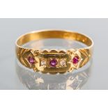 VICTORIAN RUBY AND DIAMOND RING
the ornate bezel set with alternating rubies and diamonds,