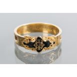 VICTORIAN MOURNING RING
enamelled in black with monogram decoration, with hairwork panels,