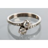 EARLY TWENTIETH CENTURY DIAMOND TWO STONE RING
set with two brilliant cut diamonds totalling