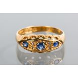 VICTORIAN EIGHTEEN CARAT GOLD SAPPHIRE AND DIAMOND RING
the boat shaped bezel set with round