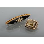 TWO NINETEENTH CENTURY BROOCHES
one of marquise form set with onyx and seed pearls,