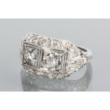 EDWARDIAN DIAMOND DRESS RING
set with two principal round diamonds totalling approximately 1.