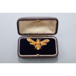 FINE VICTORIAN GOLD BEE BROOCH
with engraved details and ruby eyes, unmarked,