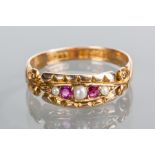 VICTORIAN RUBY AND PEARL RING
the rectangular bezel set with seed pearls and rubies,