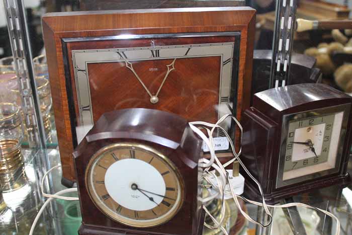 TWO SMITHS SECTRIC BAKELITE MANTEL CLOCKS
together with another square Smiths mantel clock (3)