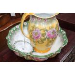 EDWARDIAN TRANSFER PRINTED WASH BASIN AND JUG
with floral decoration in pink,