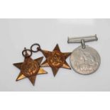 THREE WWII MEDALS AND RIBBONS
including a Defence medal,