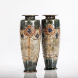 PAIR OF ROYAL DOULTON STONEWARE VASES
each with folded rims, of tapering form,