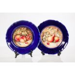 TWO ROYAL WORCESTER CABINET PLATES
each hand-painted depicting peaches and berries and pears and