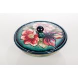 MOORCROFT ANEMONE PATTERN POWDER BOWL AND COVER
with green ground, signed, impressed marks,