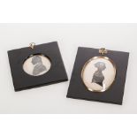 REGENCY OVAL SILHOUETTE 
of a female profile, with gold highlights, in an ebononised frame,