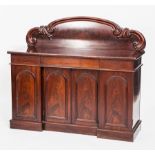 VICTORIAN MAHOGANY INVERSE SIDEBOARD 
with ornate carved back,