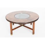 MID-20TH CENTURY SCANDINAVIAN MODERNIST-STYLE MAHOGANY COFFEE TABLE
of circular form with central