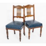 SET OF SIX LATE VICTORIAN OAK DINING CHAIRS 
with railed backs,