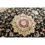 PERSIAN DESIGN SILK RUG
with foliage designs on a black field, 370cm long,