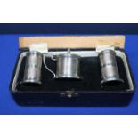 STERLING SILVER CRUET SET
comprising salt and pepper shakers and a mustard pot, plastic bases,