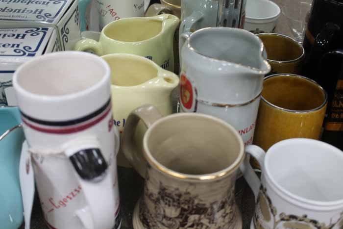 COLLECTION OF WHISKY JUGS, TANKARDS, ETC.
including Wade, Spode, West German pottery, etc.