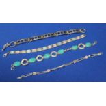 GROUP OF FOUR SILVER BRACELETS
including a turquoise bracelet, a mother of pearl bracelet,