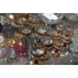 SELECTION OF GLASSES
including two sets of gilt glasses, a set of six coloured sherry glasses,