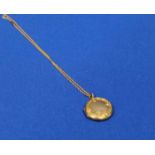 NINE CARAT GOLD LOCKET
with a nine carat gold chain, marked 375,