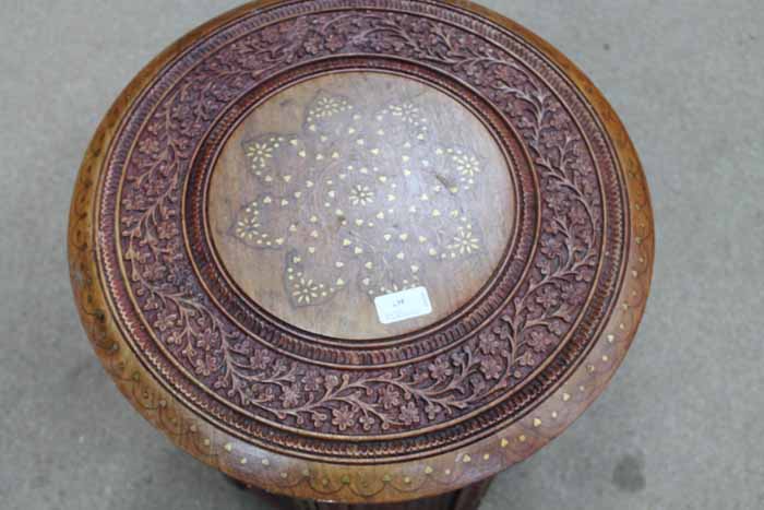 INDO-PERSIAN OCTANGONAL FOLDING TABLE
top inlaid with brass foliate design and base with geometric