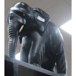 CARVED EBONISED WOODEN FIGURE MODELLED AS AN ELEPHANT
34cm high