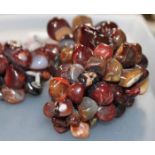 COLLECTION OF BANDED AGATE AND ROSE QUARTZ STONES
modelled as bunches of grapes