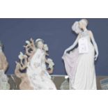 FIVE LLADRO AND NAO FIGURES
including a Lladro figure of a 1930's lady dancer,