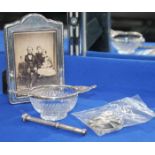 SELECTION OF SILVER ITEMS
including a photograph frame with a photograph of a Victorian family,