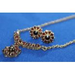 GARNET CLUSTER NECKLACE AND EARRING SET
with a central principal garnet cluster of 12mm suspended